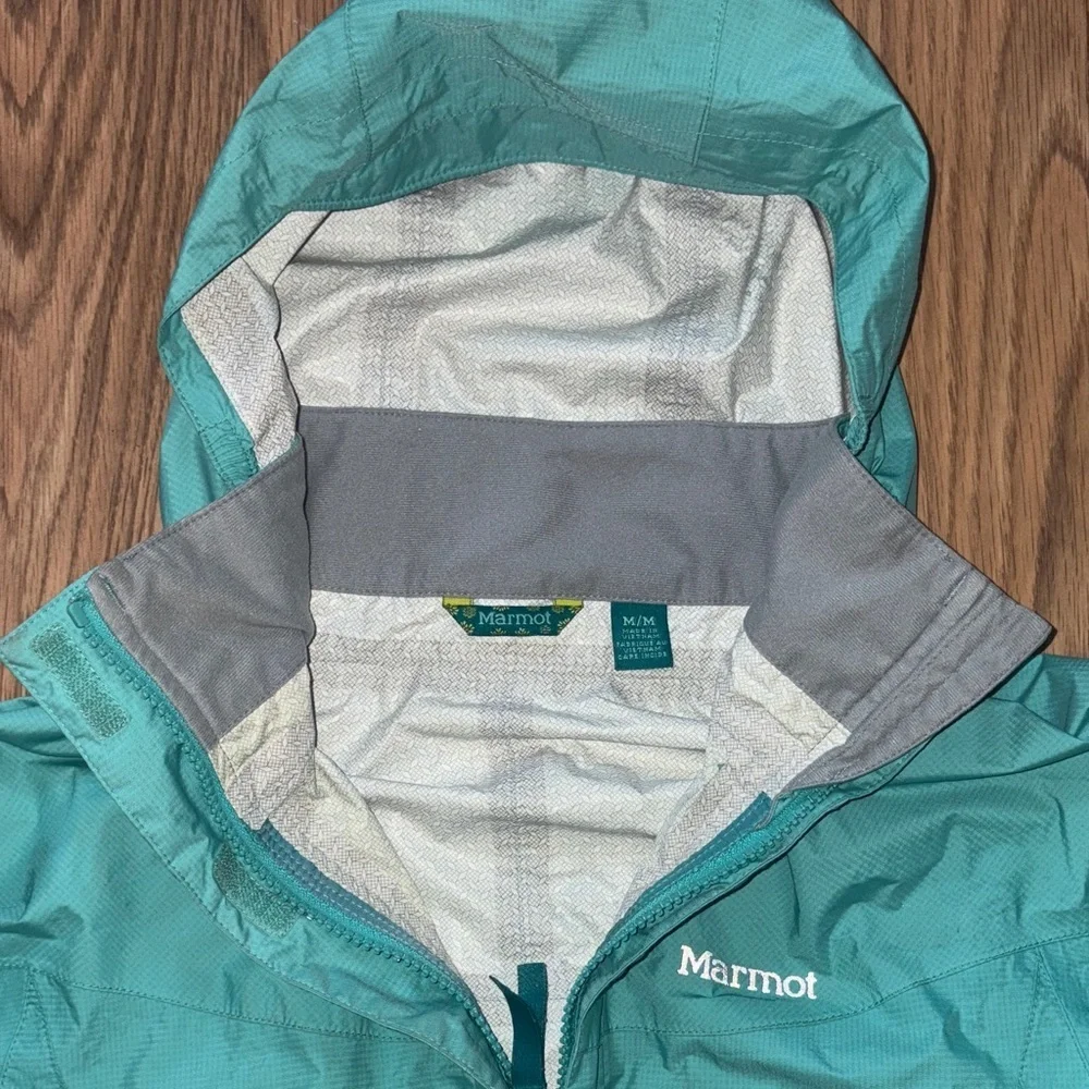 Girls waterproof jacket Marmot. Windproof. Outdoor performance wear.